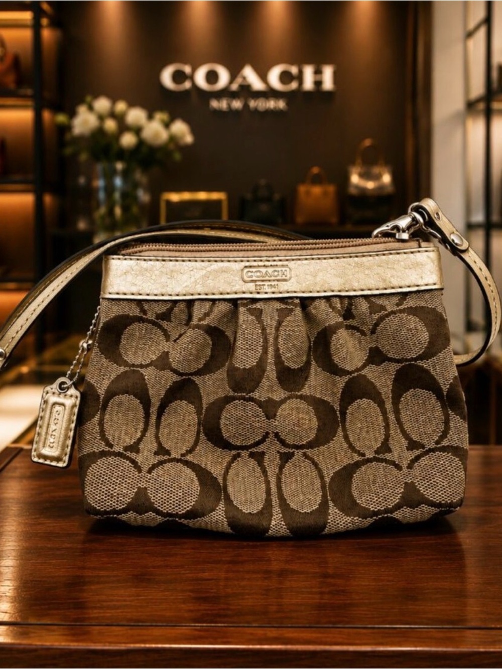 COACH Signature Canvas Wristlet in Brown/Gold
